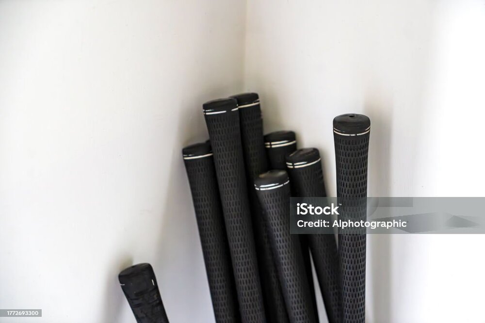 golf club grips in the corner